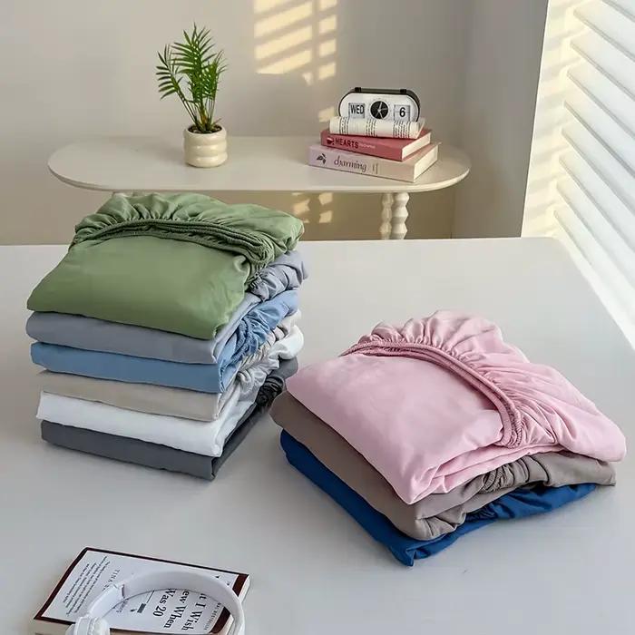 Drap-housse de couleur unie