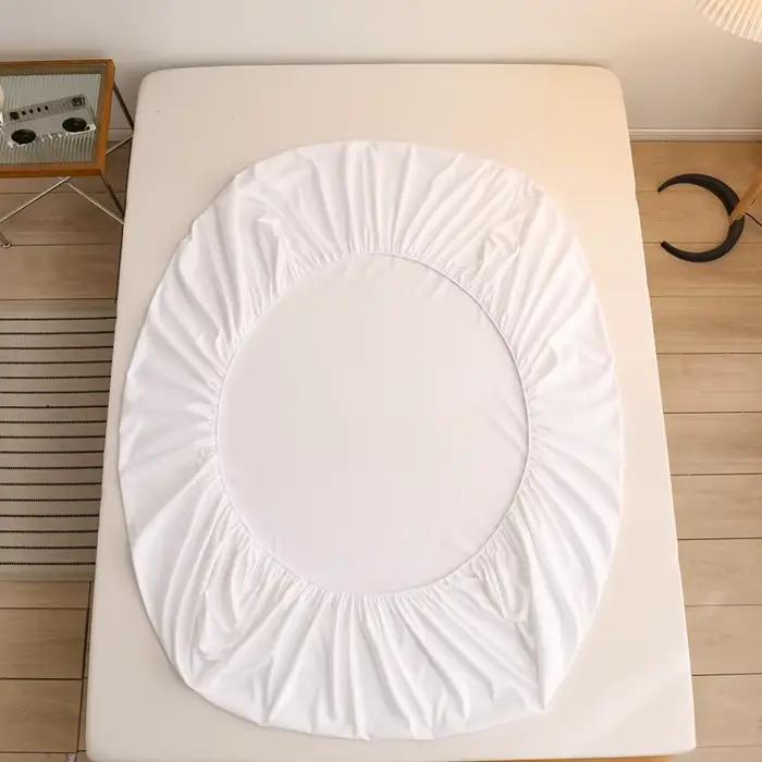Drap-housse de couleur unie