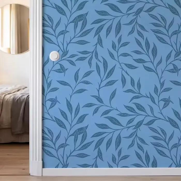 Papier peint esthétique aux feuilles bleues