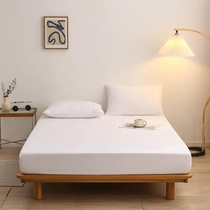 Drap-housse de couleur unie