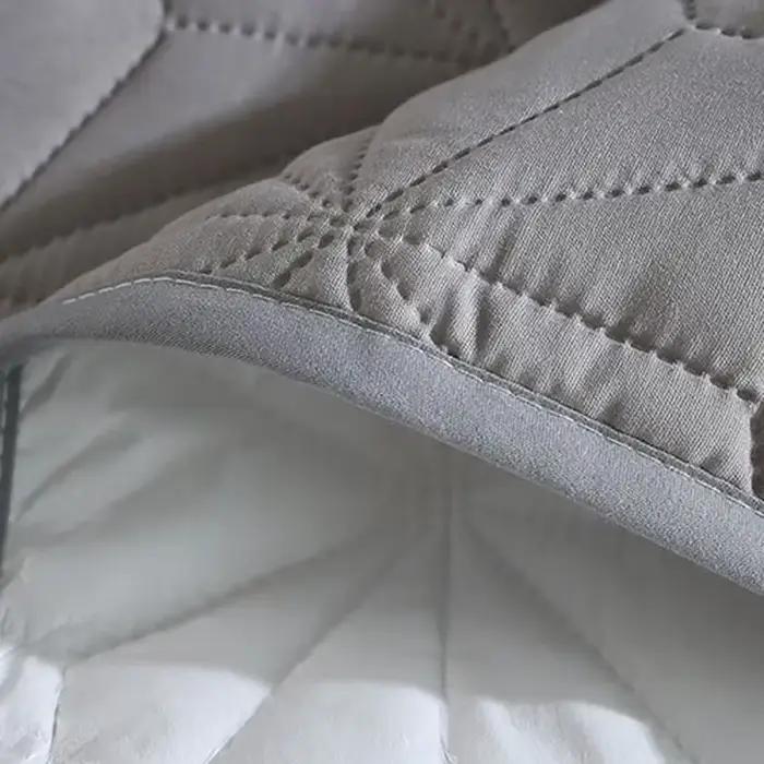 Coussin de lit imperméable matelassé en coton Sandwich