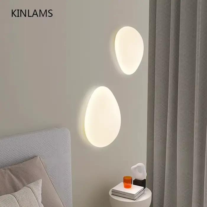 Lampe murale galets salon hôtel fond applique