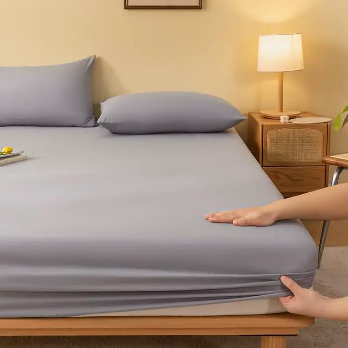 Drap-housse de couleur unie
