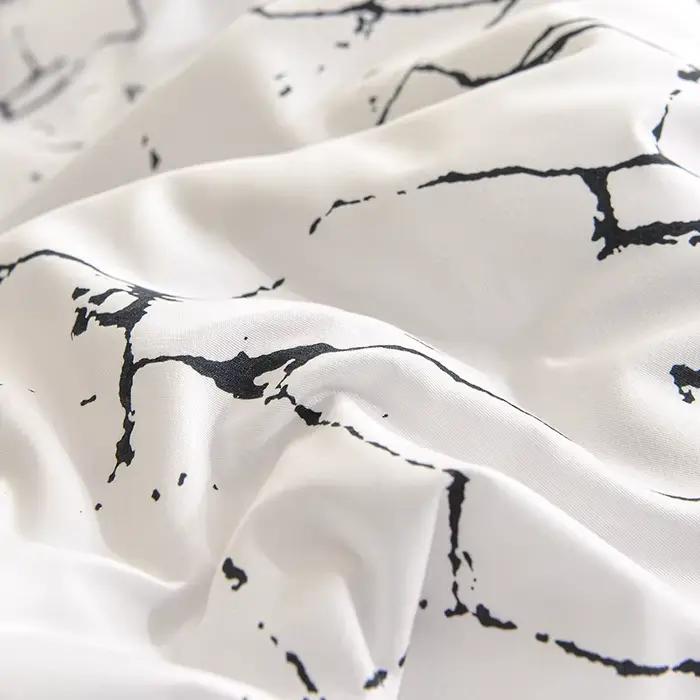 Parure de lit noire et blanche pour lit double