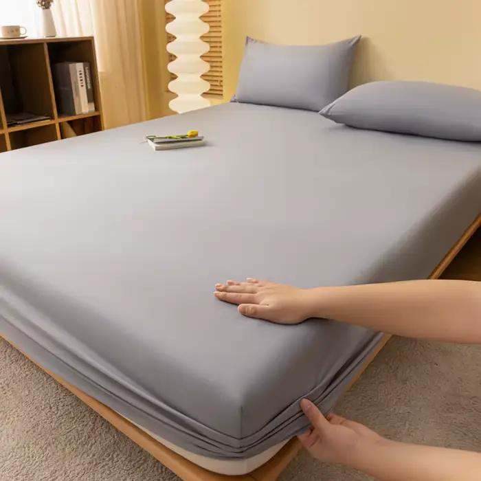 Drap-housse de couleur unie