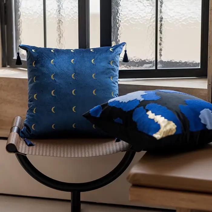 Housse de coussin bleue de qualité supérieure