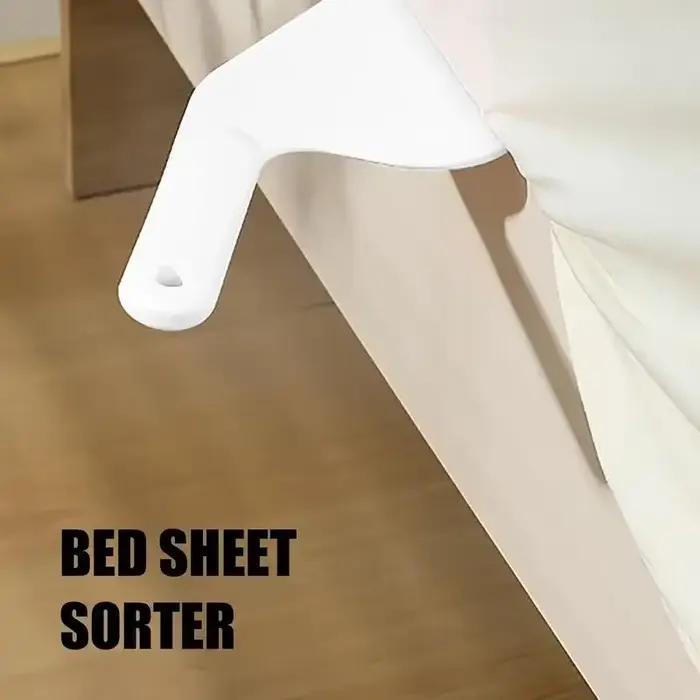 Outil d'aide au changement de drap de lit