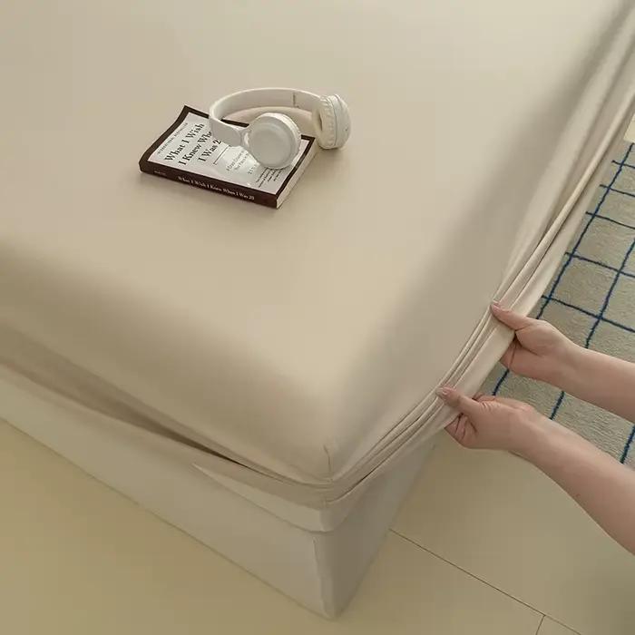 Drap-housse de couleur unie