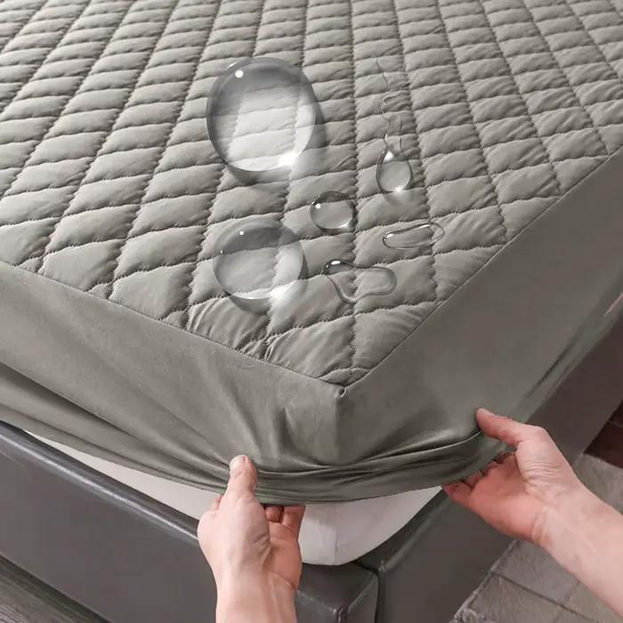 Protège-matelas imperméable gris/blanc