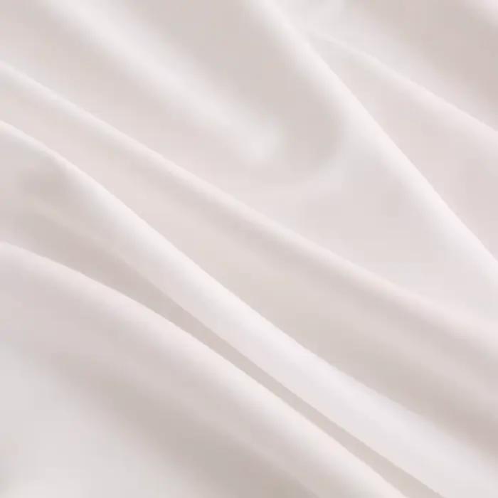 Drap-housse de couleur unie