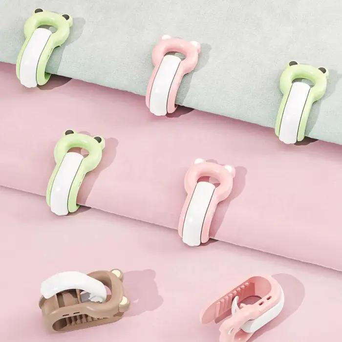 Clips de lit pour maintenir les draps