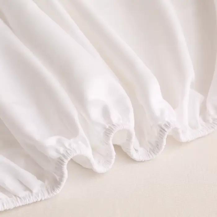 Drap-housse de couleur unie