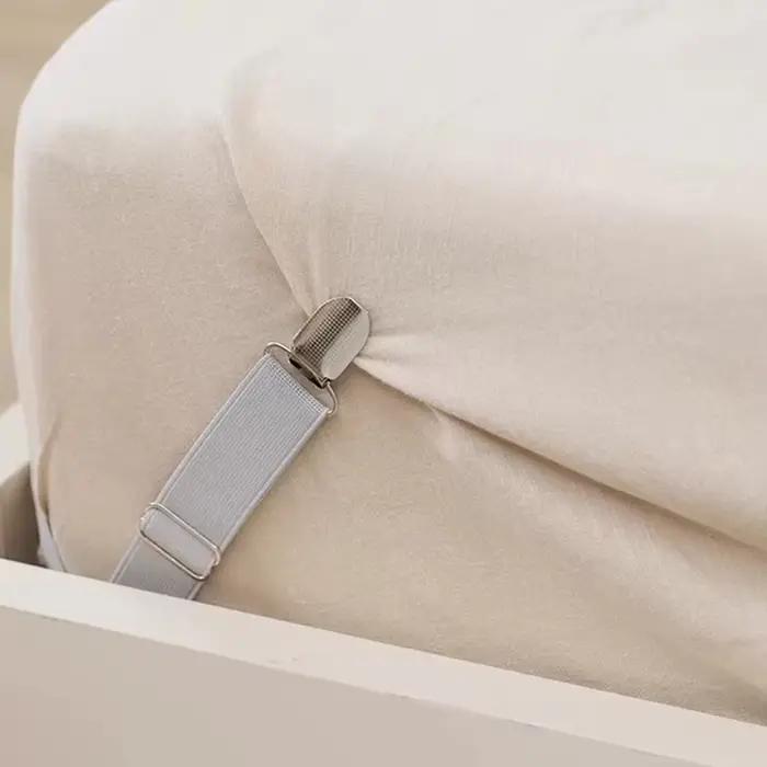 Attaches de drap de lit réglables