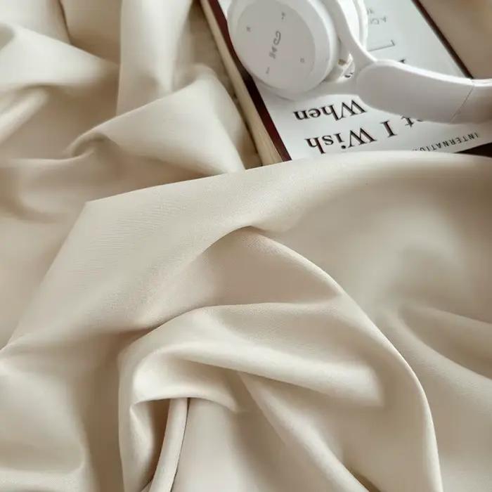 Drap-housse de couleur unie
