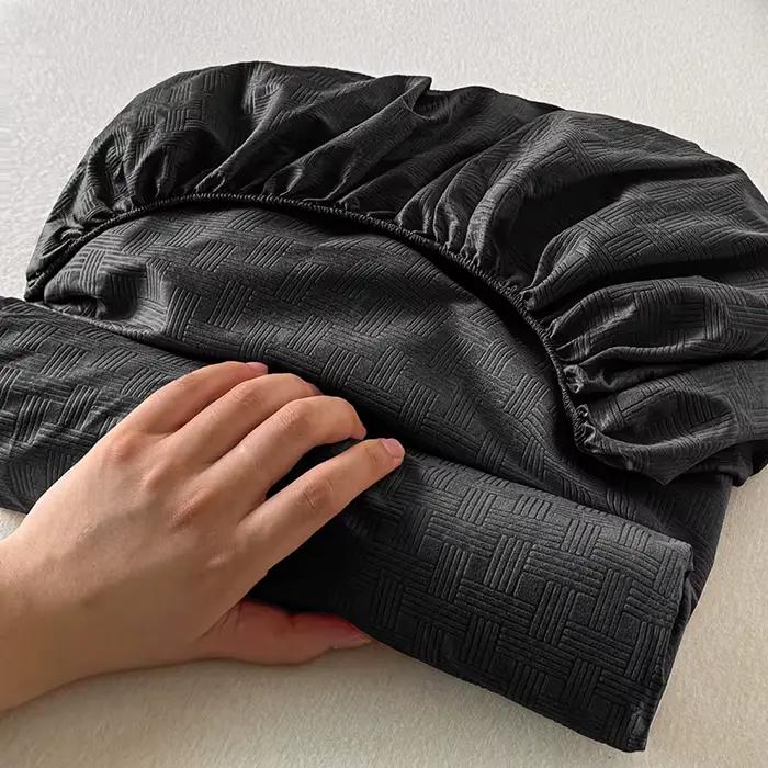 Drap-housse avec élastiques antidérapants