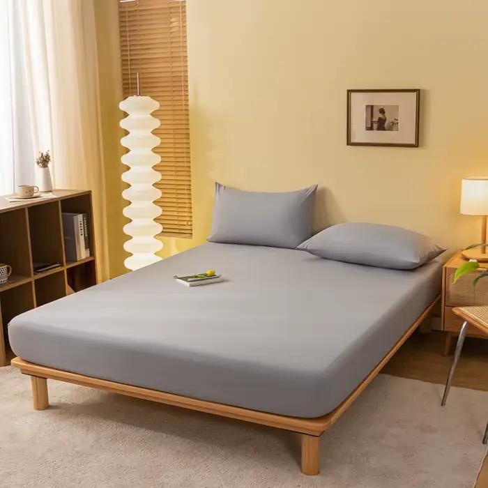 Drap-housse de couleur unie