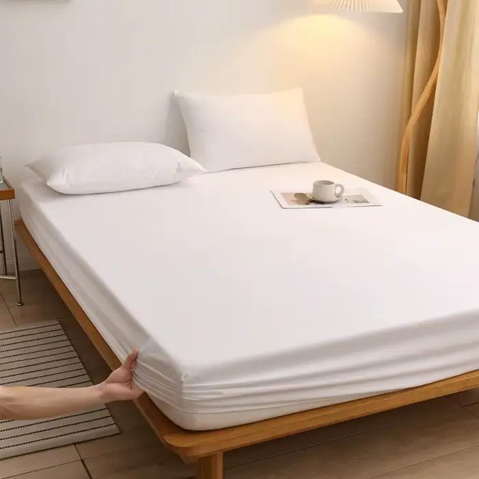 Drap-housse de couleur unie