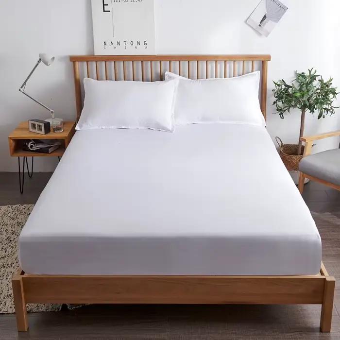 Ensemble de draps-housses en coton