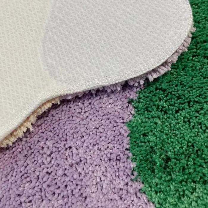 Tapis touffeté de chevet longue ondulée