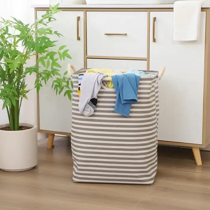 Panier à linge en coton et lin pliable avec doublure imperméable et poignées en bois pour chambre