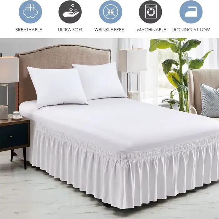 Jupe de lit élastique enveloppante autour des rides