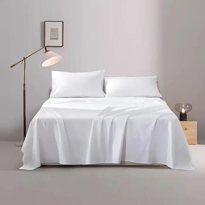 Un drap de lit simple (sans taie d'oreiller ou noyau), draps de lit simple ou double d'hôtel blanc p