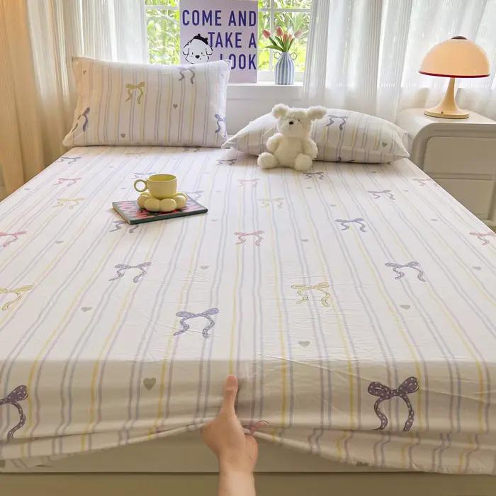 Ensemble de draps de lit à nœud rayé