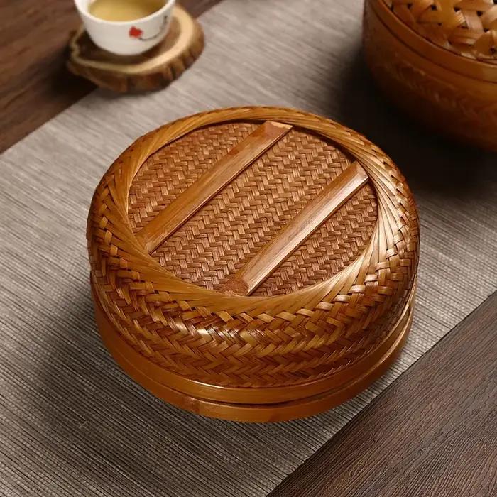 Boîte de rangement ronde en bambou faite à la main avec couvercle