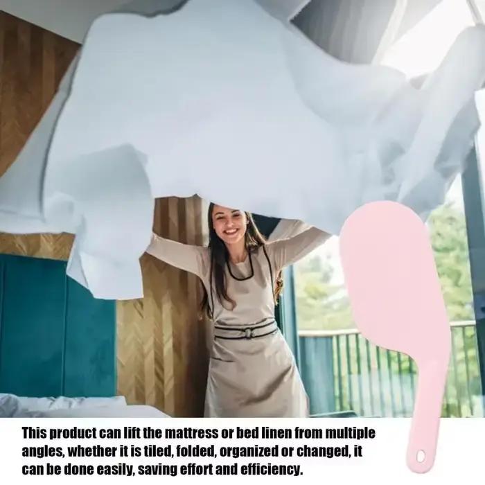 Outil d'aide au changement de drap de lit