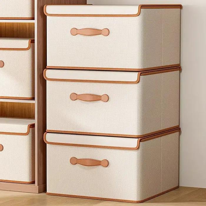 Boîte de rangement pour vêtements avec couvercle