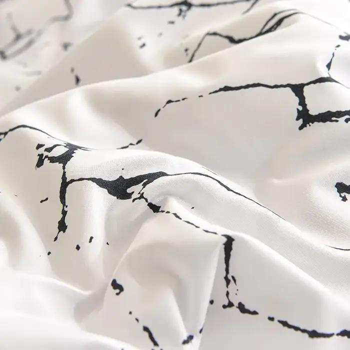 Parure de lit noire et blanche pour lit double