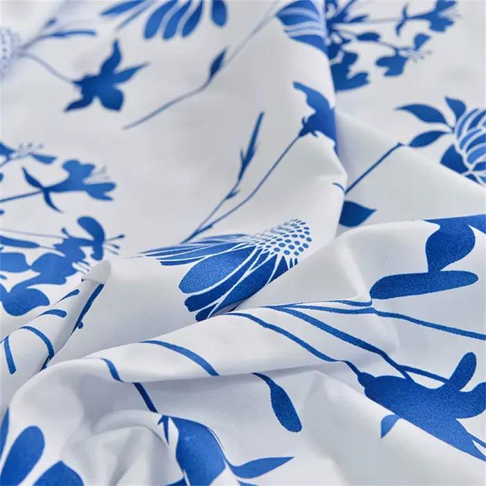 Drap-housse double avec élastique imprimé de fleurs bleues